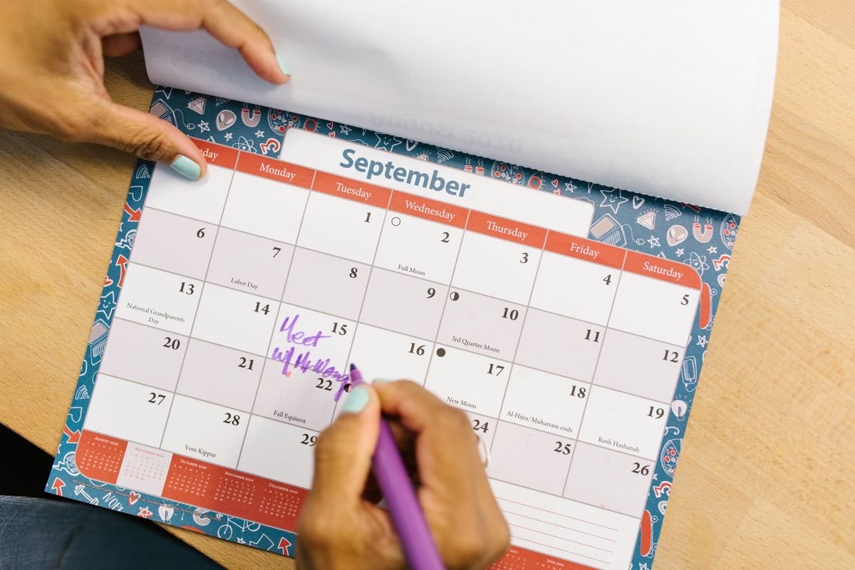 A calendar page marked with a pen, illustrating planning ahead